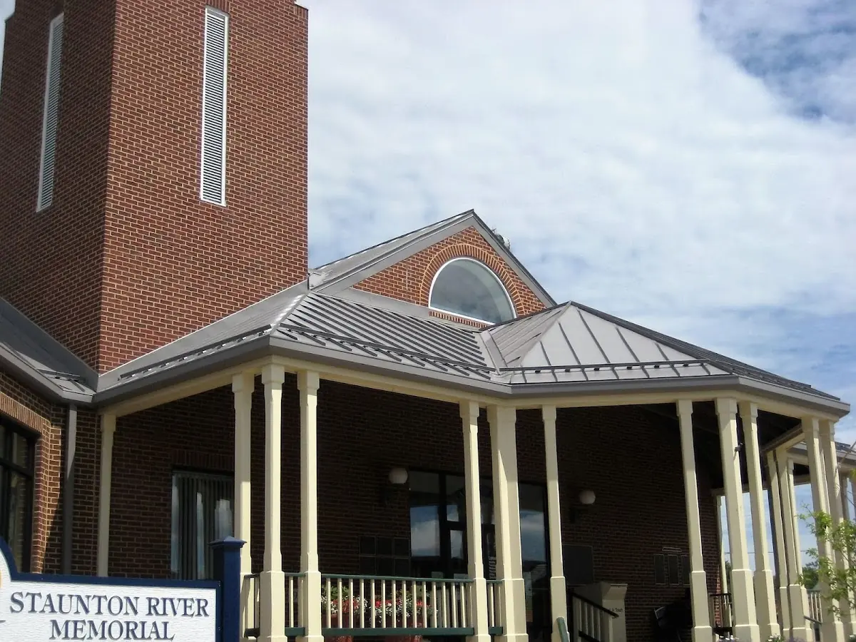 Skilled roofing craftsmen working on a residential roof in Jacobsville
